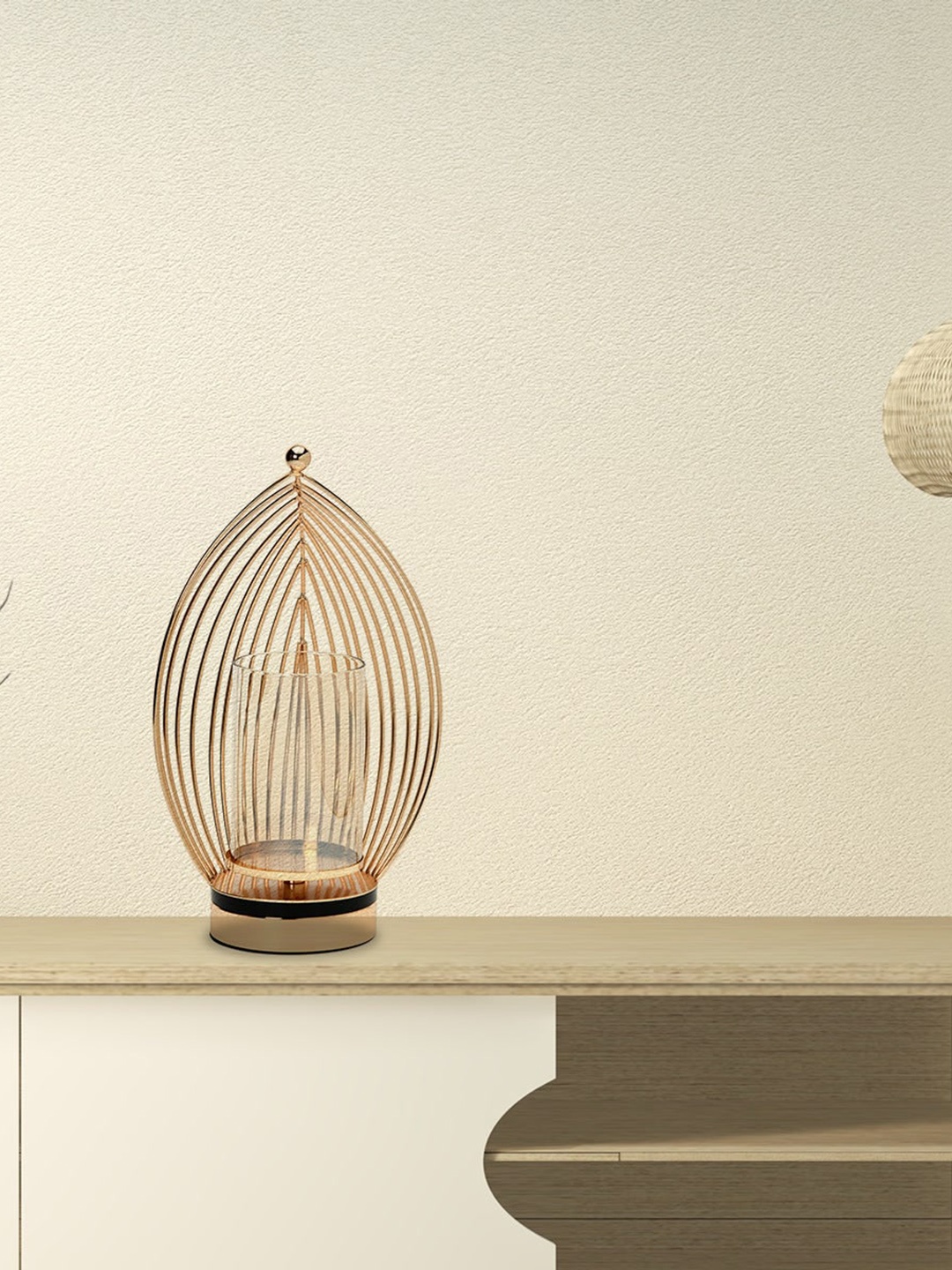 

Athome by Nilkamal Gold-Toned Half Jali Oval Candle Stand