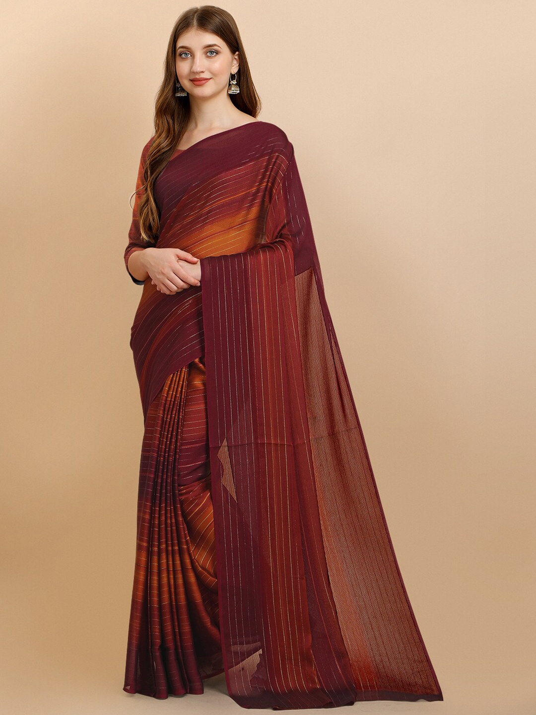 

Iris Maroon Striped Zari Pure Georgette Saree