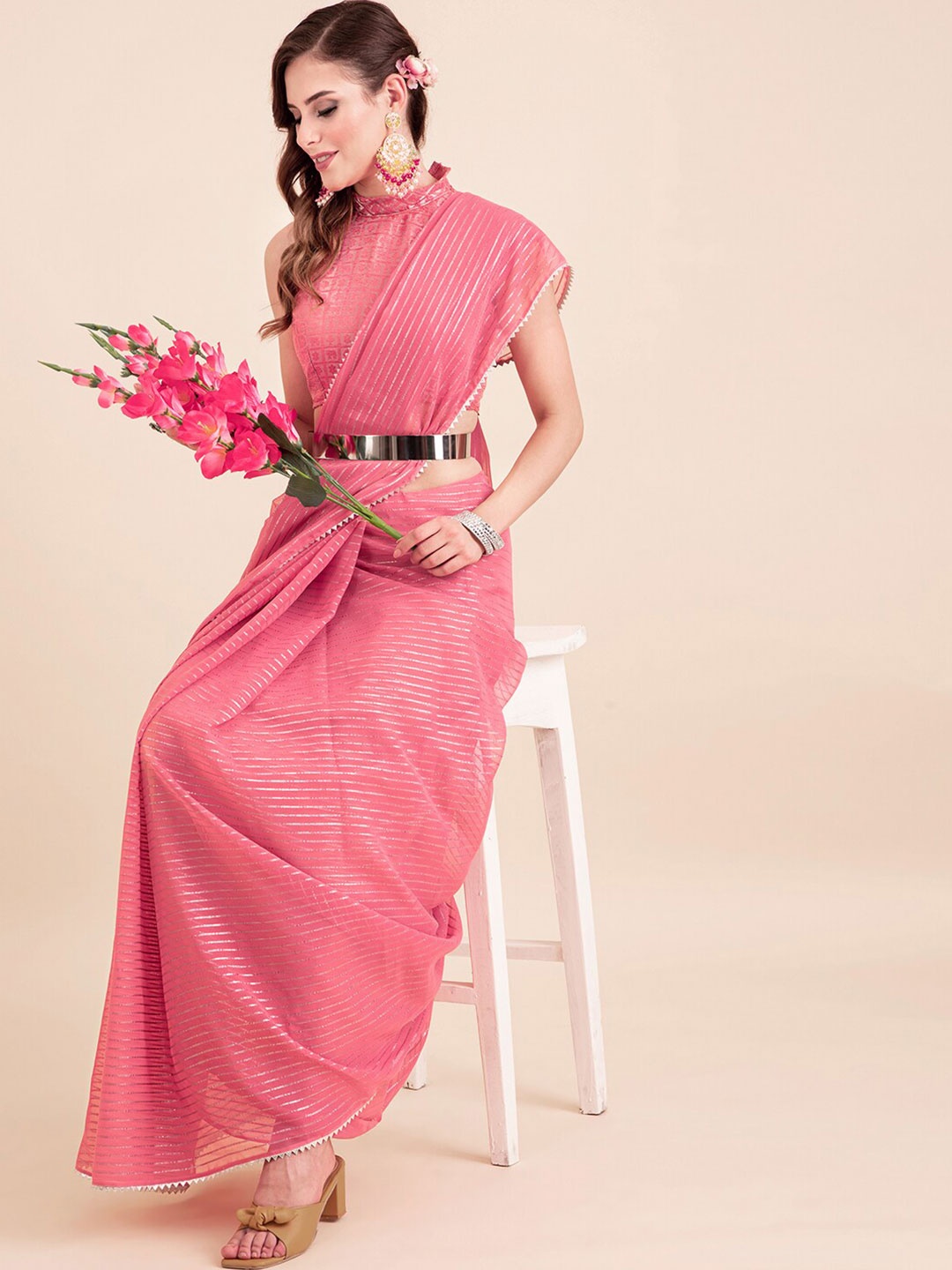 

Sangria Pink Poly Chiffon Embellished Zari Striped Saree