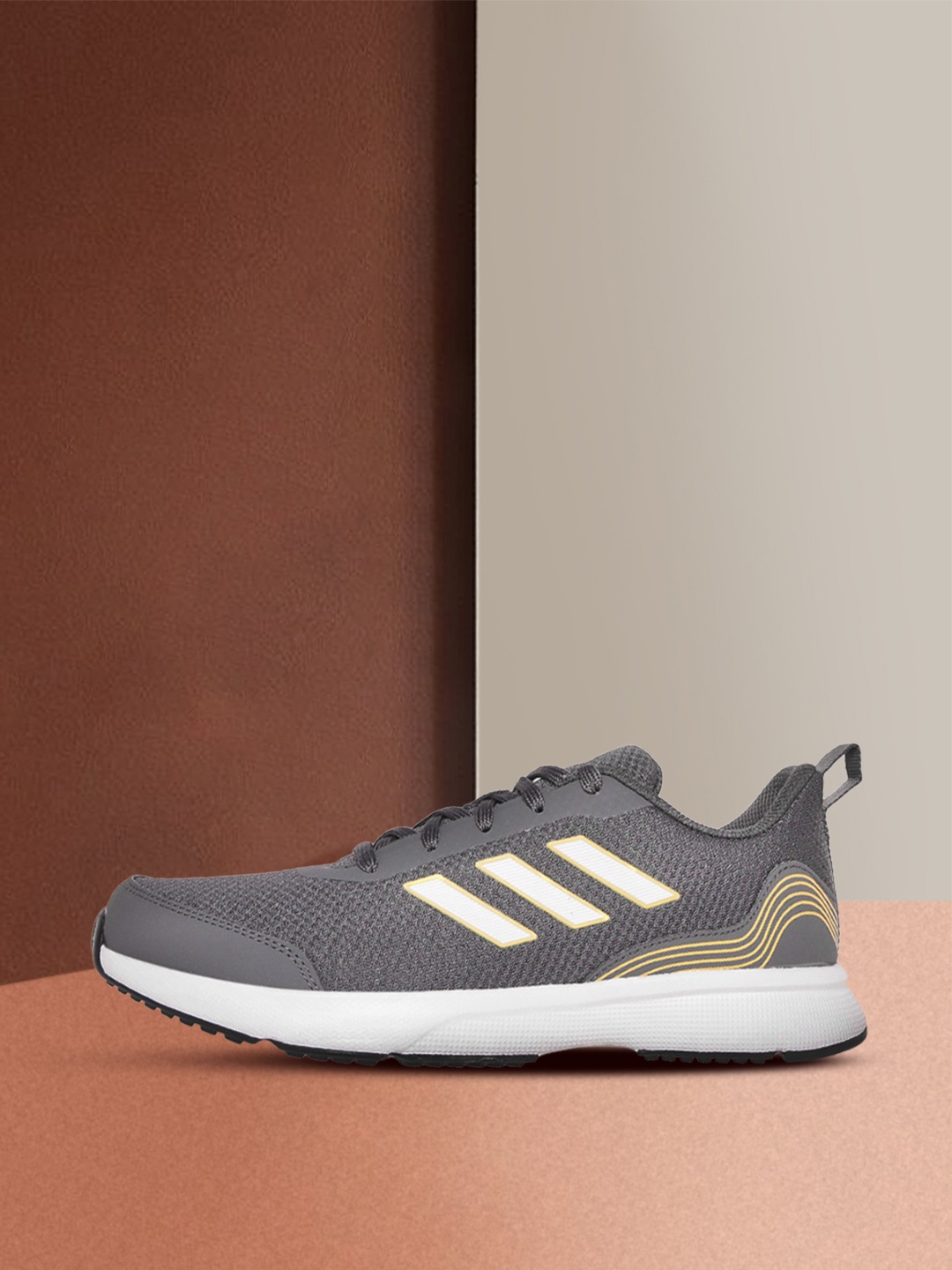 

ADIDAS Men Grey & Gold-Toned Woven Design Runmagica Running Shoes