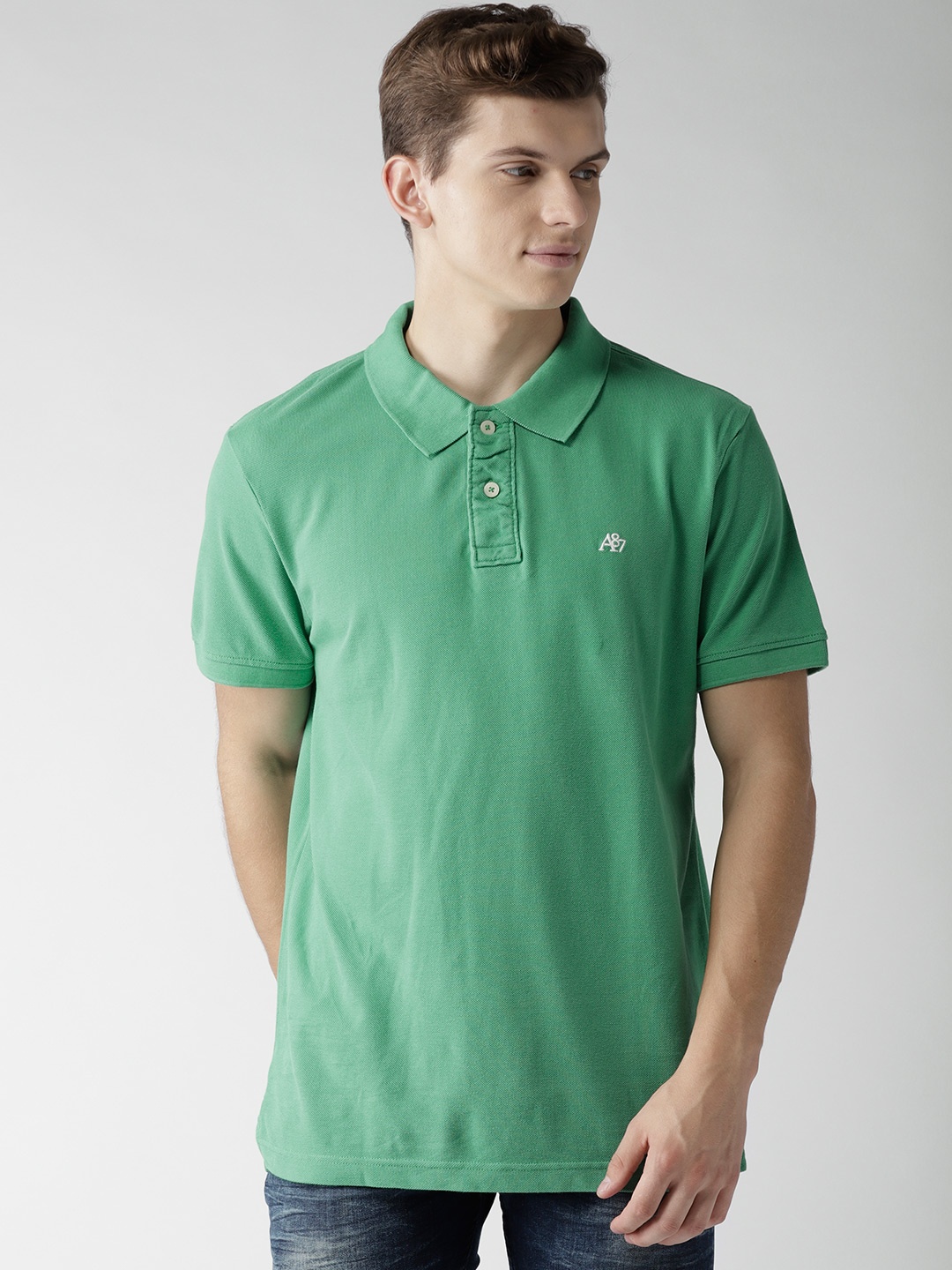 

Aeropostale Men Green Solid Polo Pure Cotton T-shirt