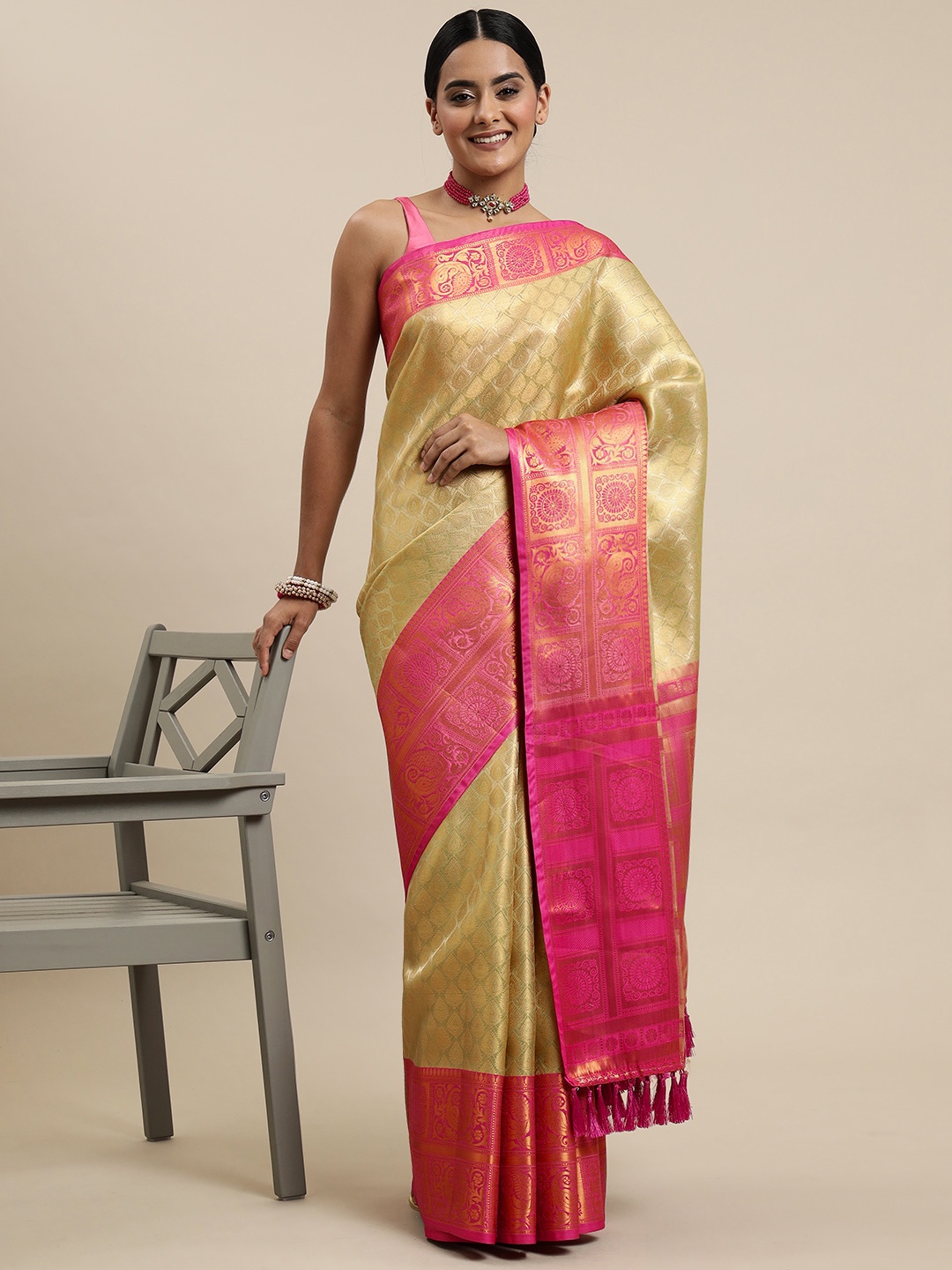 

Mitera Green & Golden Ethnic Motifs Zari Organza Kanjeevaram Saree