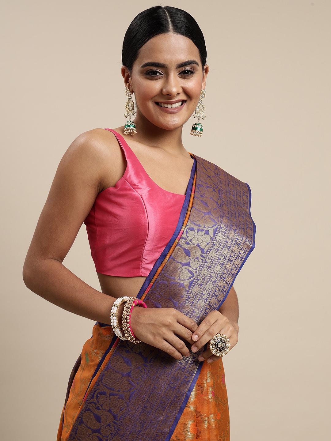 

Mitera Orange & Purple Ethnic Motifs Zari Organza Saree