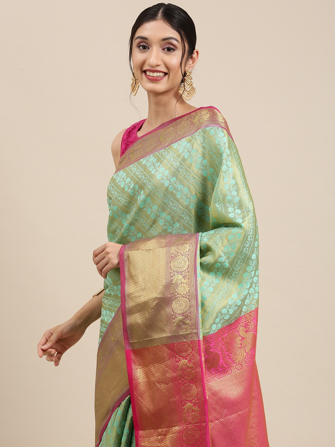 

Mitera Sea Green & Golden Ethnic Motifs Zari Silk Blend Kanjeevaram Saree