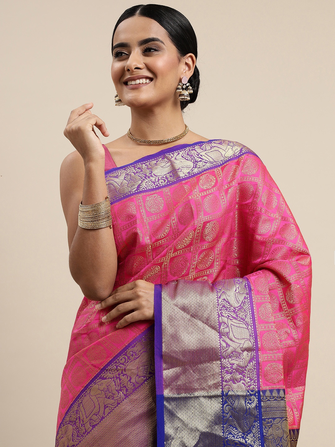

Mitera Pink & Blue Ethnic Motifs Zari Silk Blend Kanjeevaram Saree