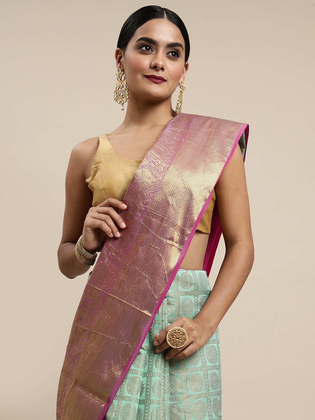 

Mitera Sea Green & Pink Checked Zari Silk Blend Saree