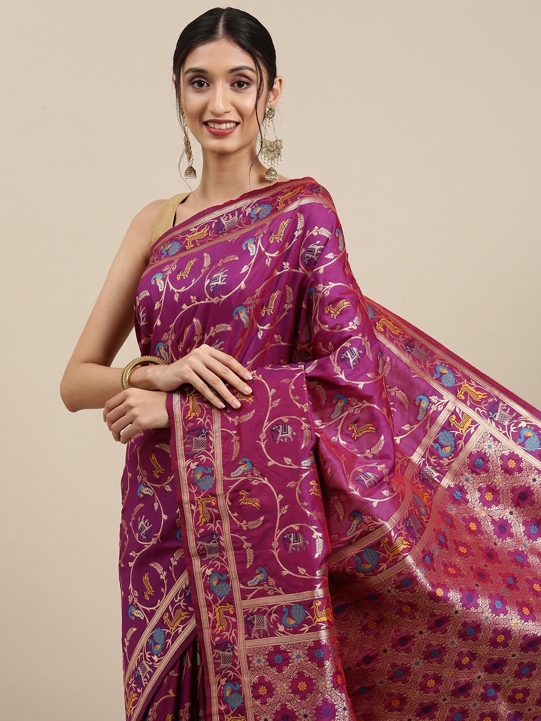 

Mitera Burgundy & Golden Ethnic Motifs Zari Silk Blend Saree