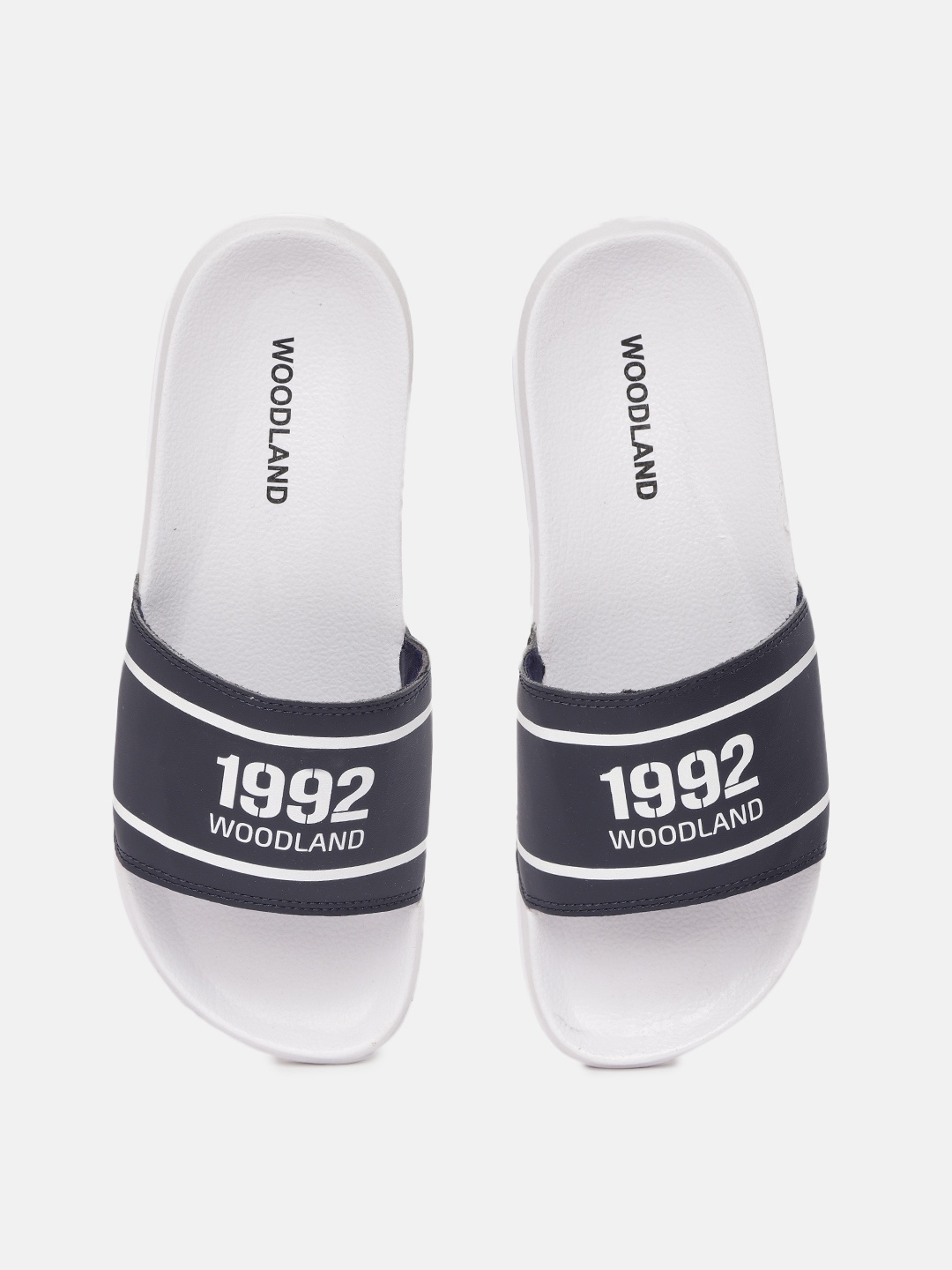 

Woodland Men Navy Blue & White Printed Sliders