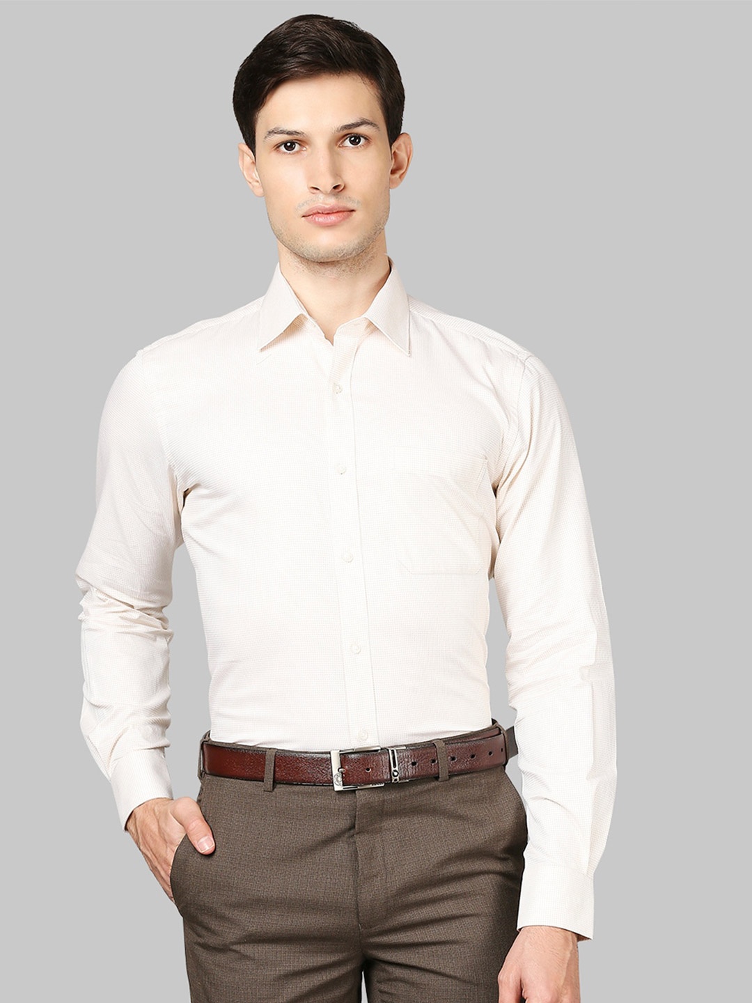 

Raymond Men Beige Solid Cotton Formal Shirt