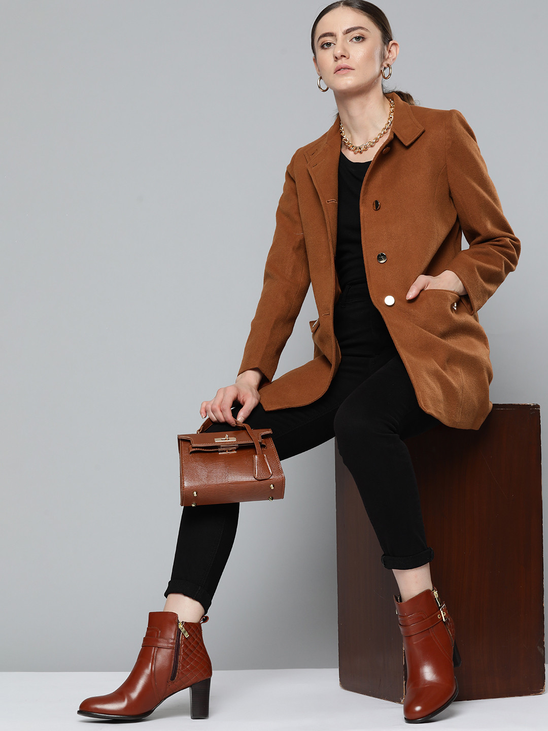 

Chemistry Women Brown Solid Woollen Over Coat with Button Highlights, Rust