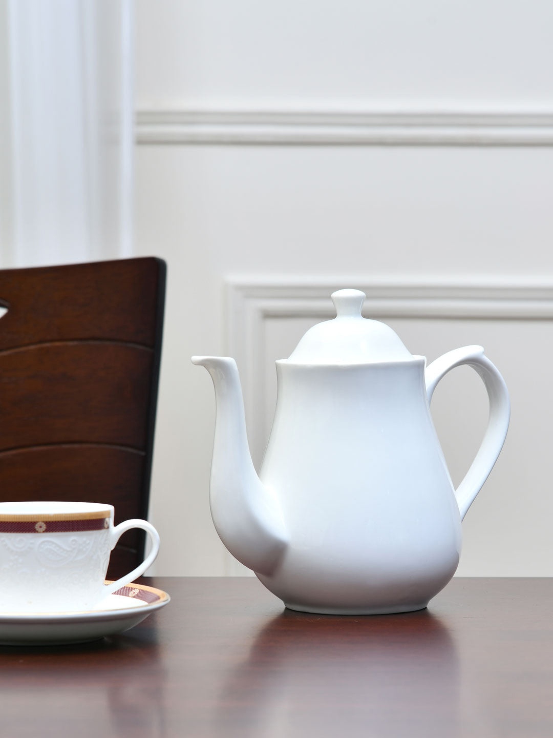 

Athome by Nilkamal White Solid Ceramic Matte Kettle