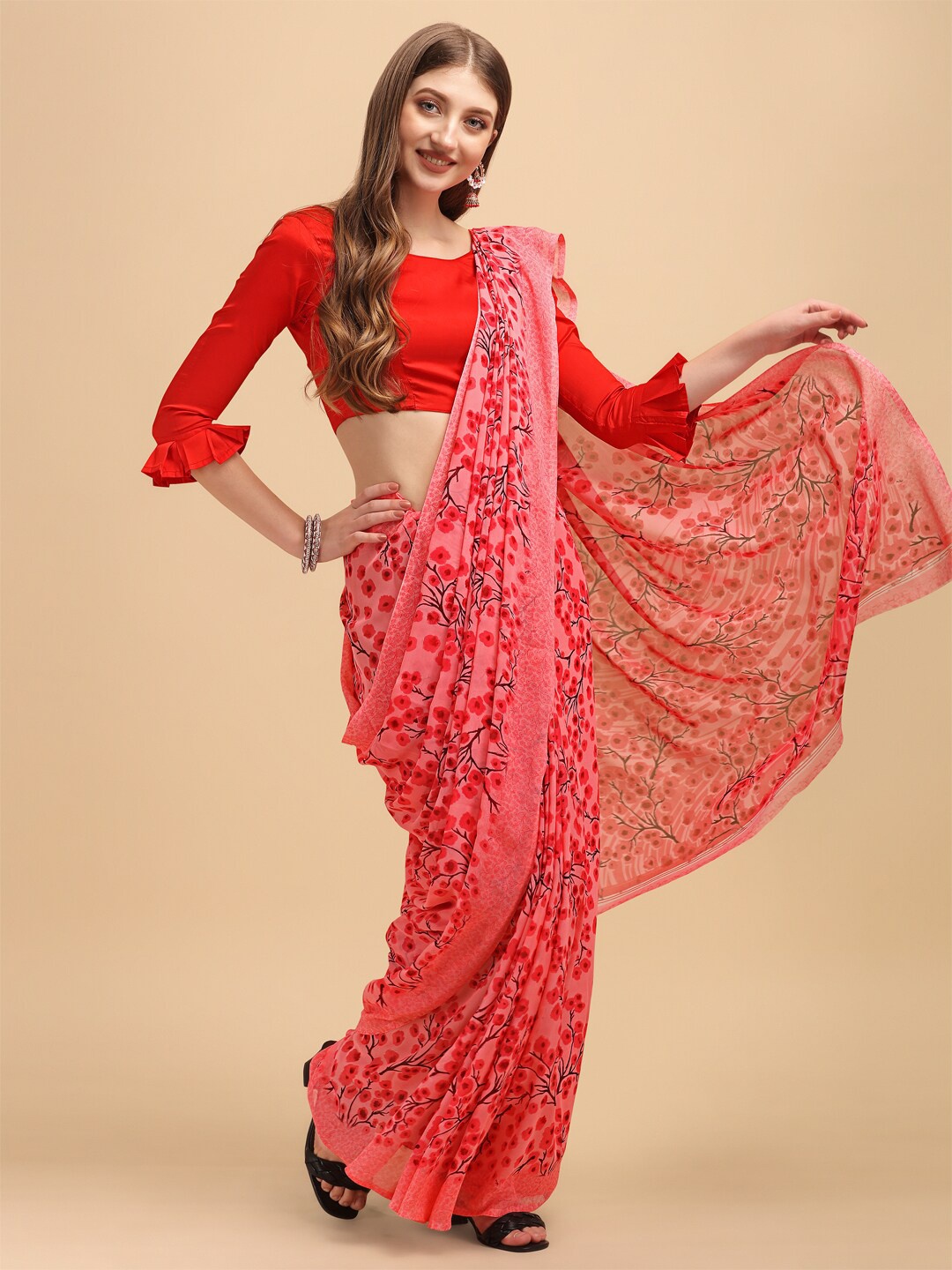 

Sangria Peach-Coloured & Black Floral Saree