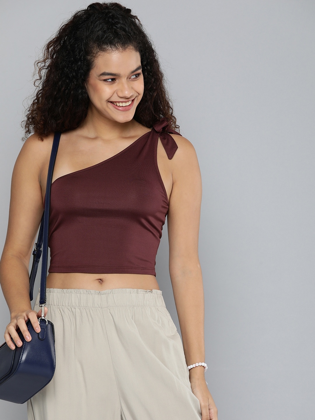 

HERE&NOW Women Wine-Coloured Solid One Shoulder Sleeveless Crop Top, Maroon