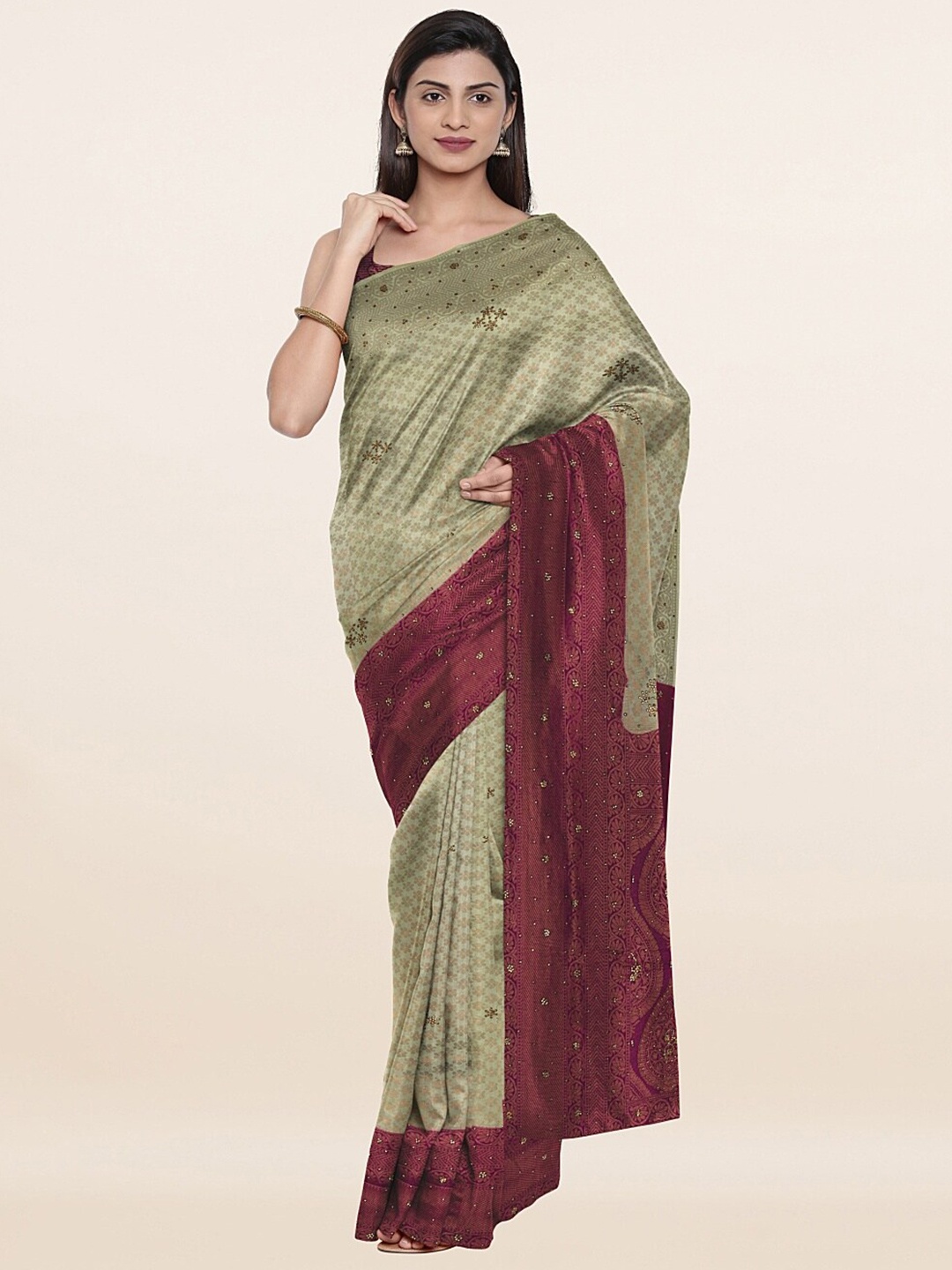 

Pothys Green & Golden Ethnic Motifs Beads and Stones Pure Silk Saree