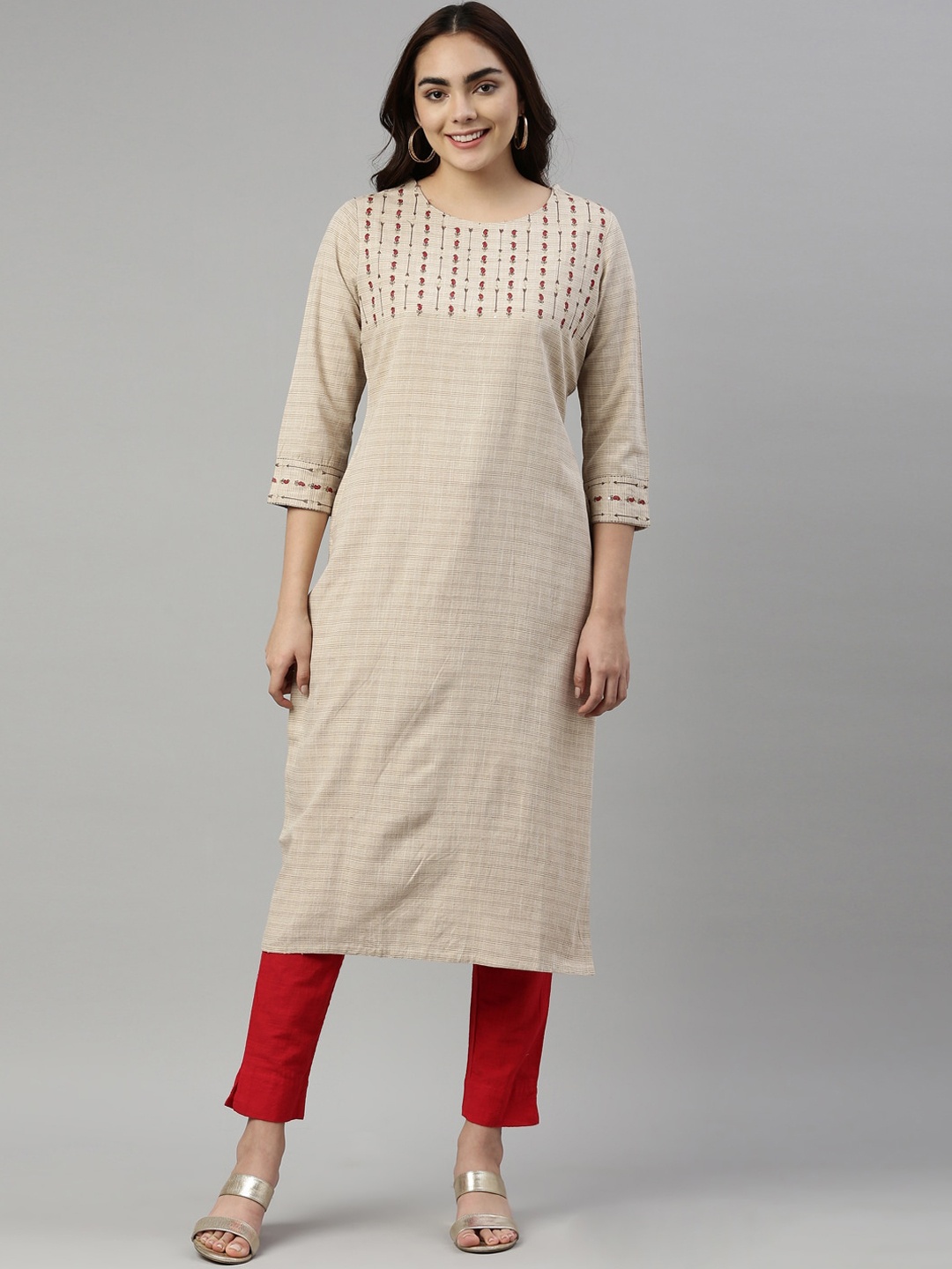 

Neerus Women Beige & Red Ethnic Motifs Embroidered Thread Work Kurta