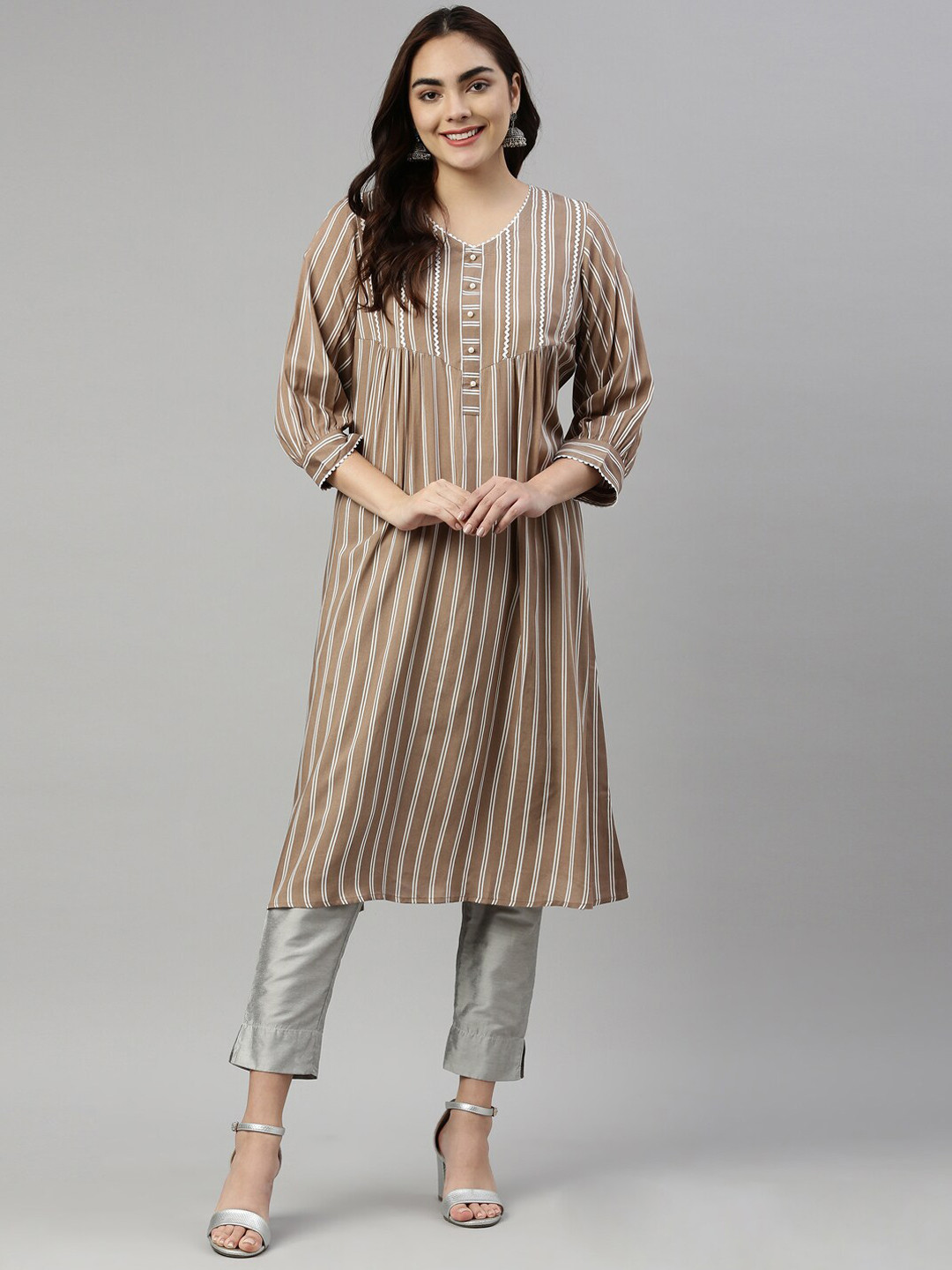 

Neerus Women Brown Striped Thread Work Empire Kurta