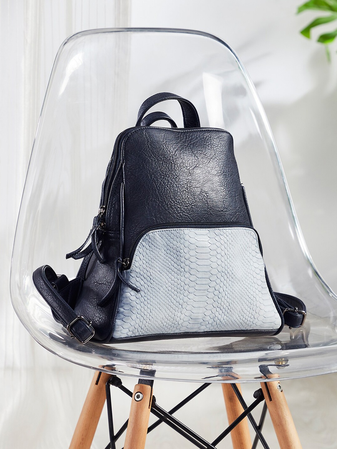 

Mona B Women Navy Blue & Blue Colourblocked Backpack
