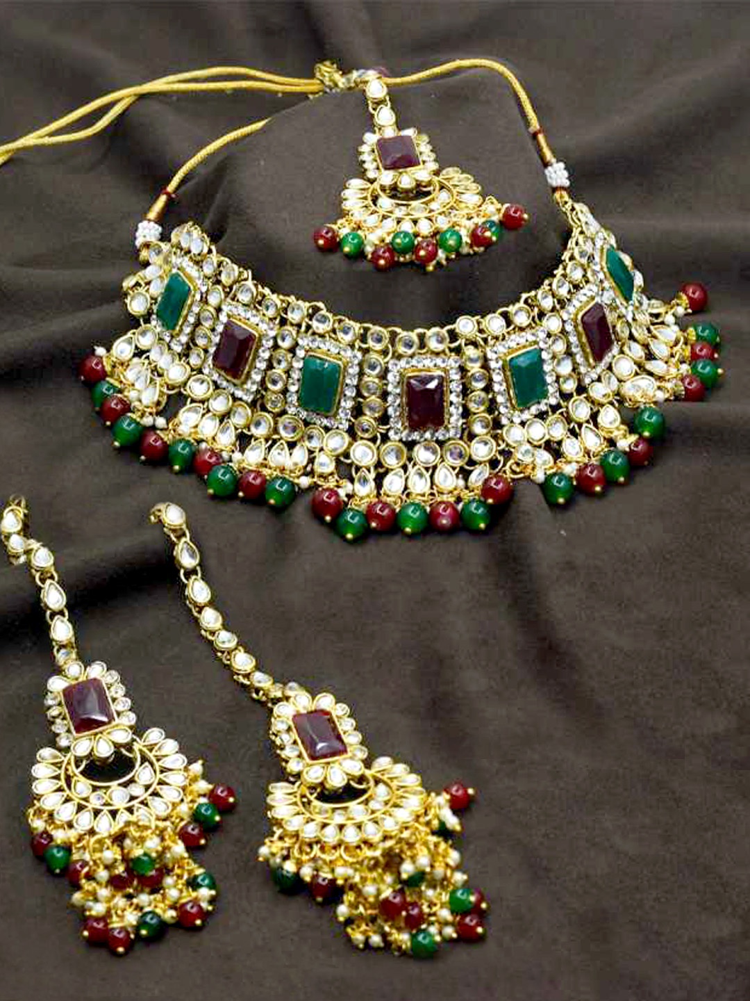 

SAIYONI Green & Maroon stone studded Gold plated Kundan Jewellery Set