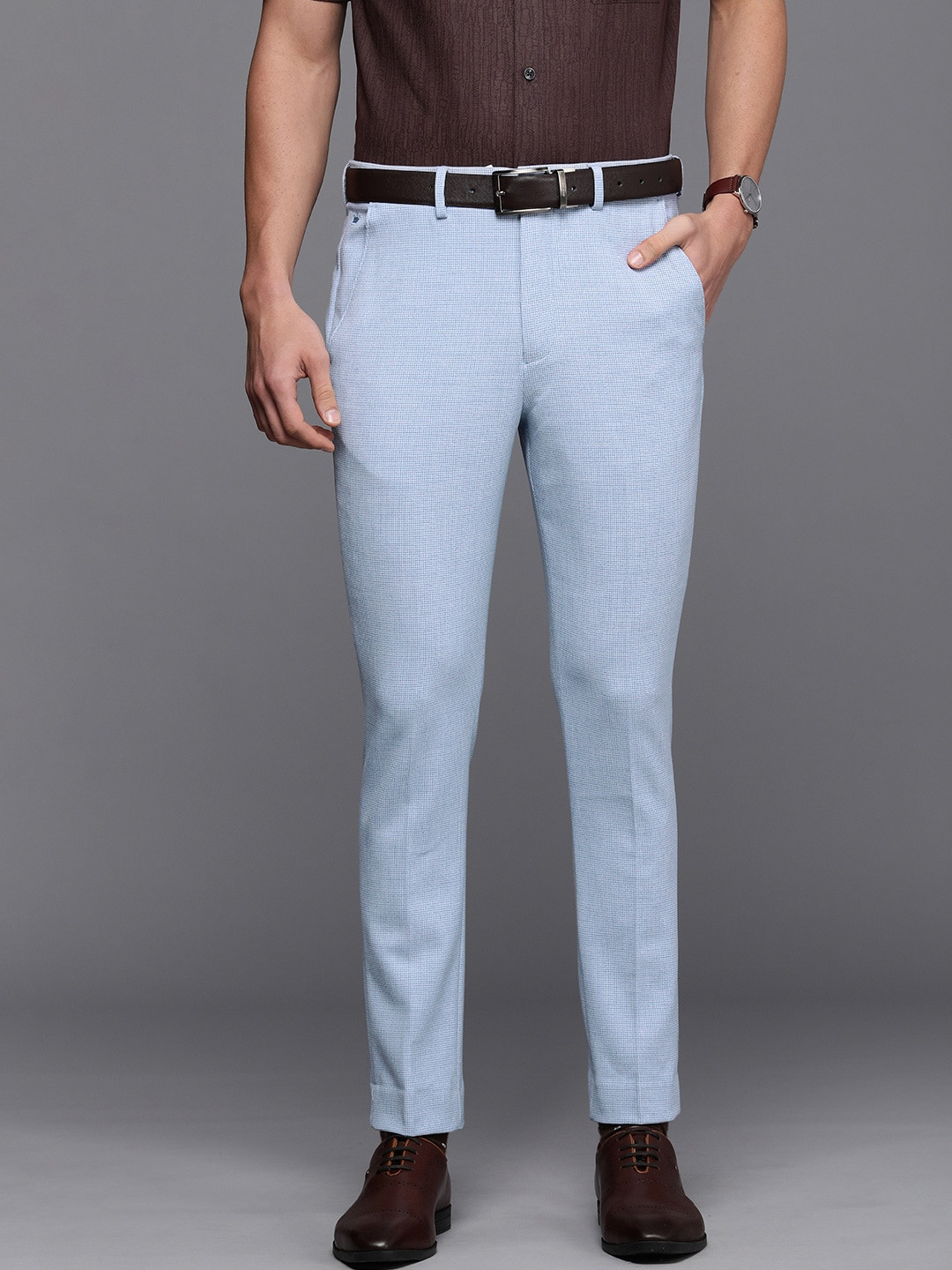 

Louis Philippe Men Blue Textured Carrot Fit Trousers