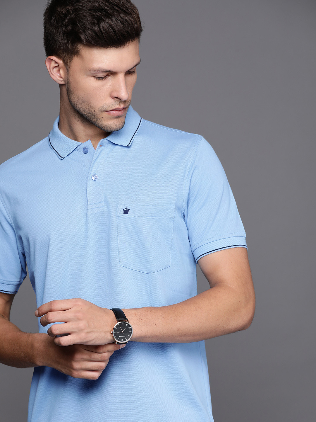 

Louis Philippe Men Blue Solid Polo Collar Golf T-shirt