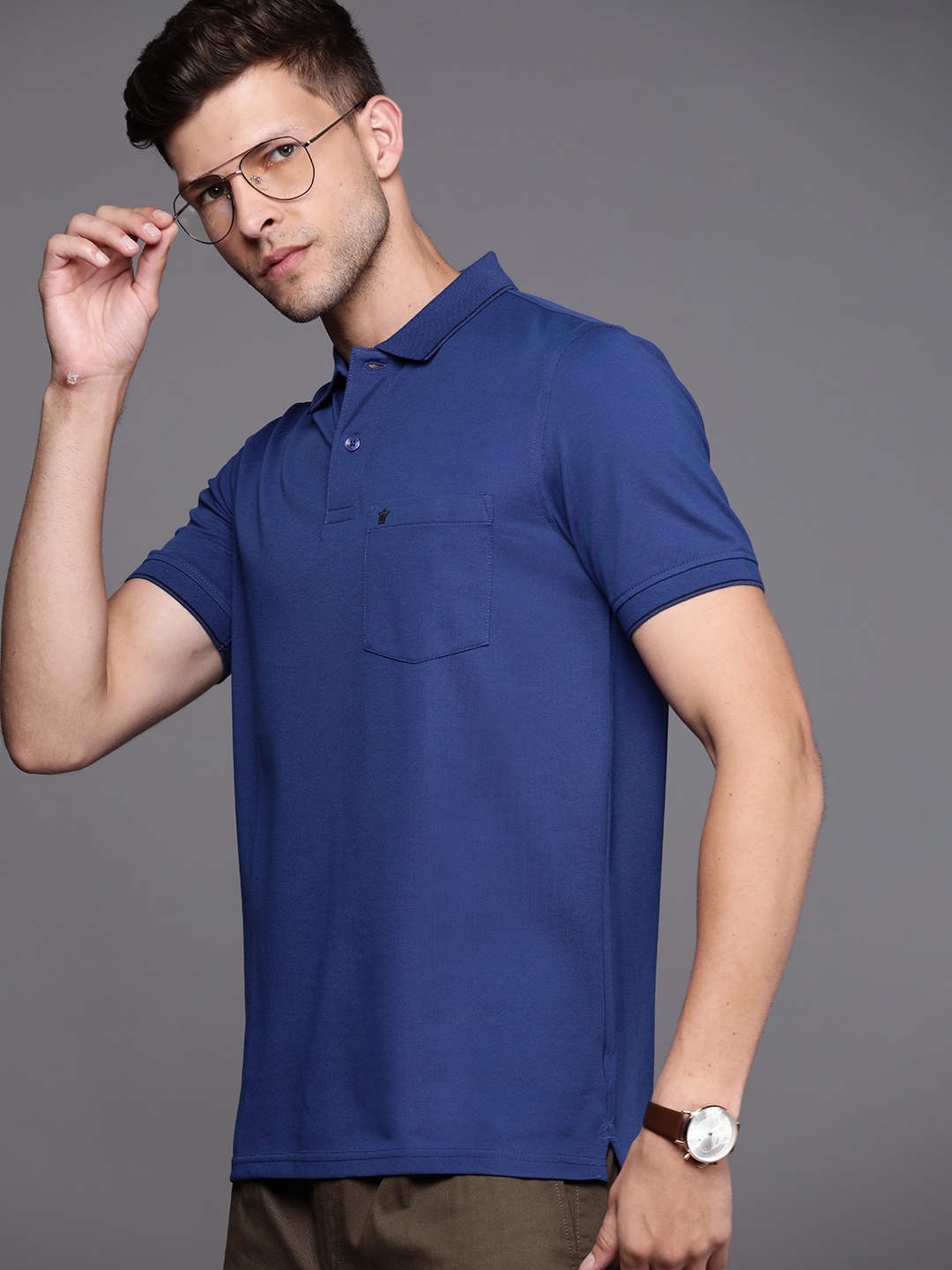 

Louis Philippe Men Navy Blue Solid Polo Collar Golf T-shirt