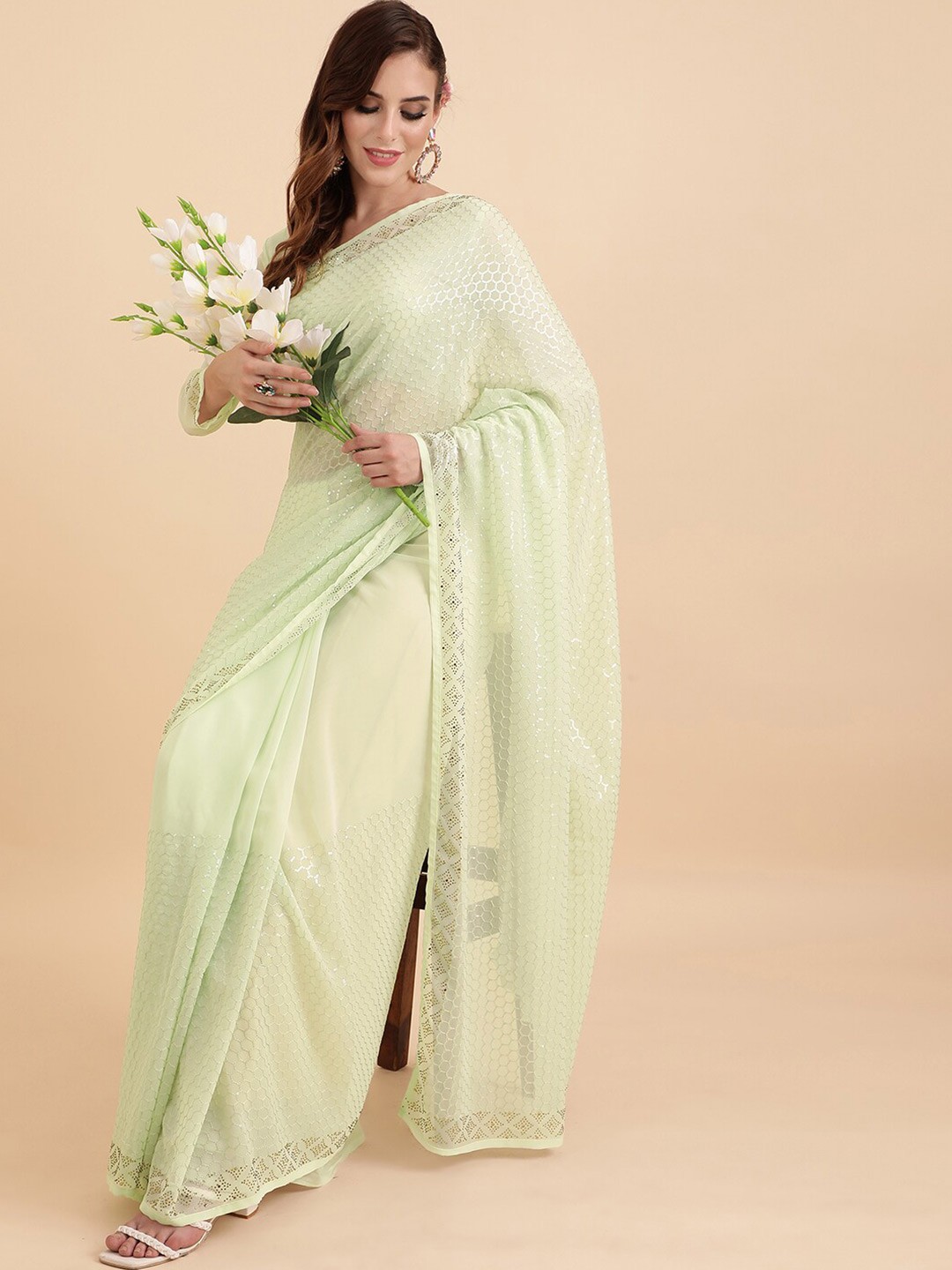 

Sangria Green & Golden Embellished Pure Georgette Sequinned Saree