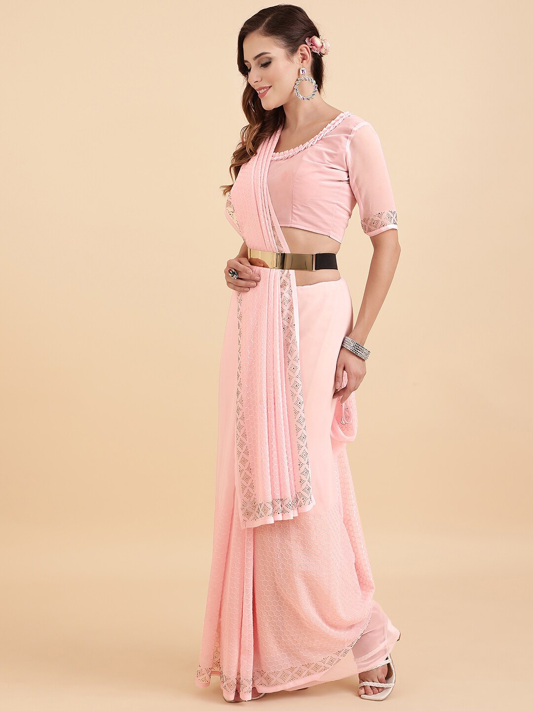 

Sangria Pink & Golden Embellished Sequinned Pure Georgette Saree