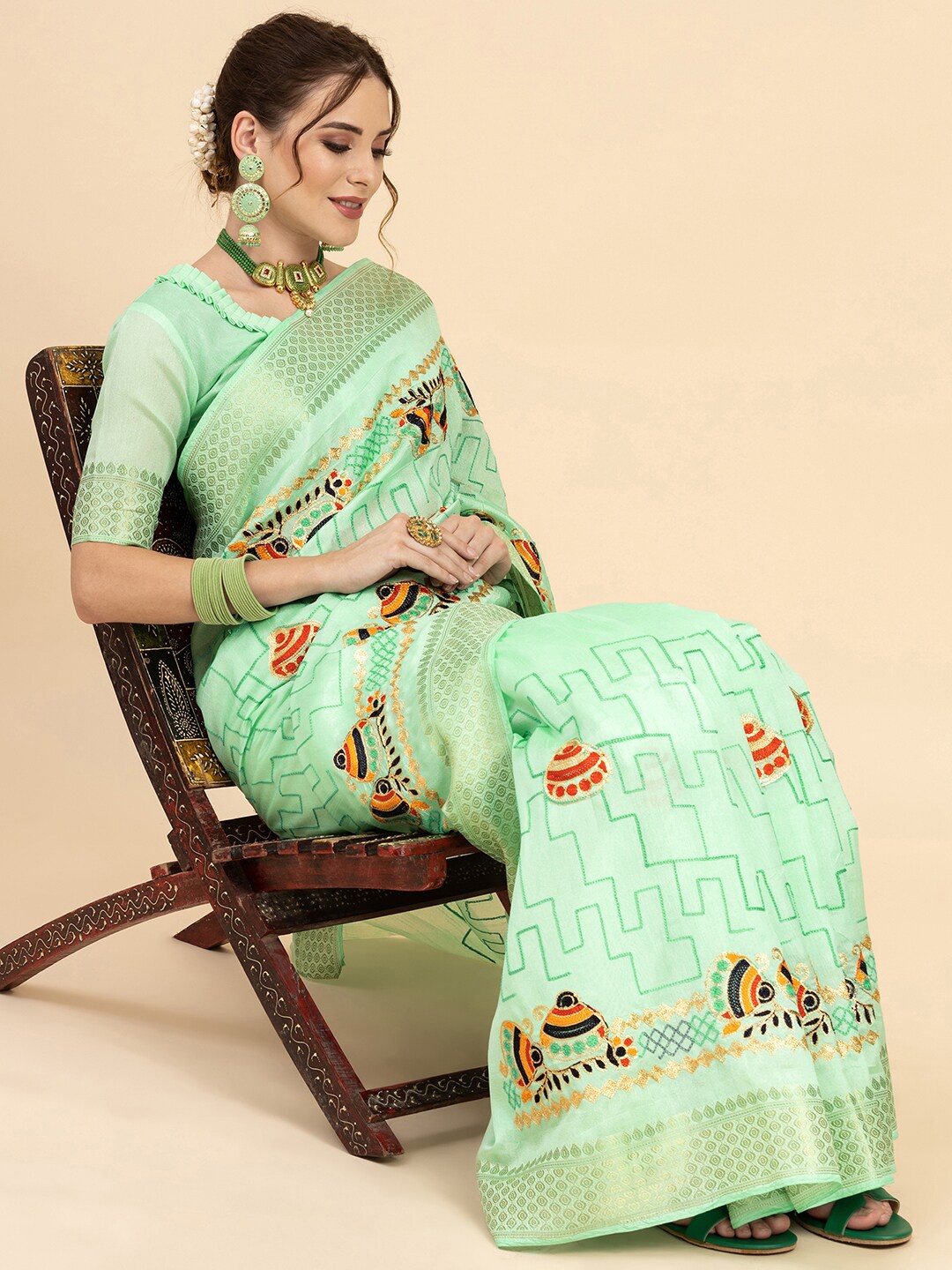 

Sangria Green & Black Embroidered Saree