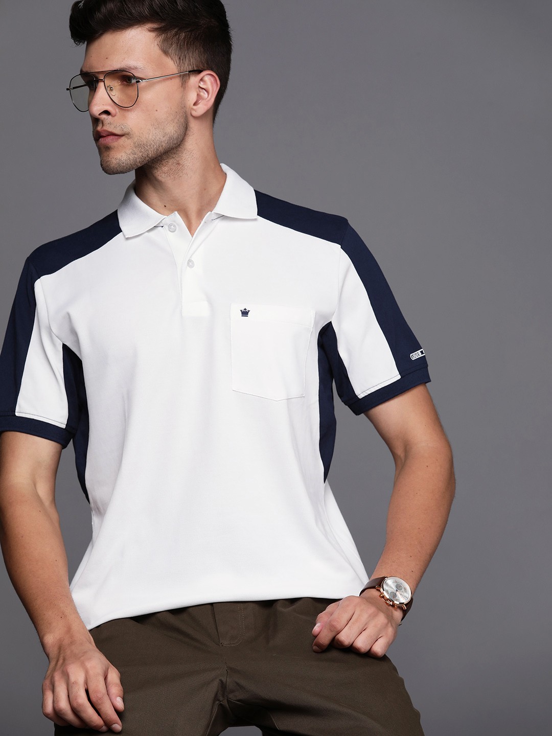 

Louis Philippe Men White & Navy Blue Solid Polo Collar Golf T-shirt