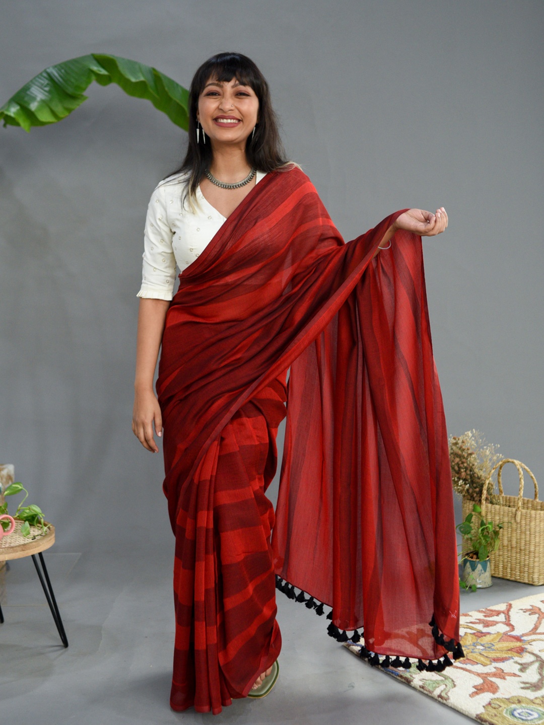 

Suta Maroon & Black Striped Saree
