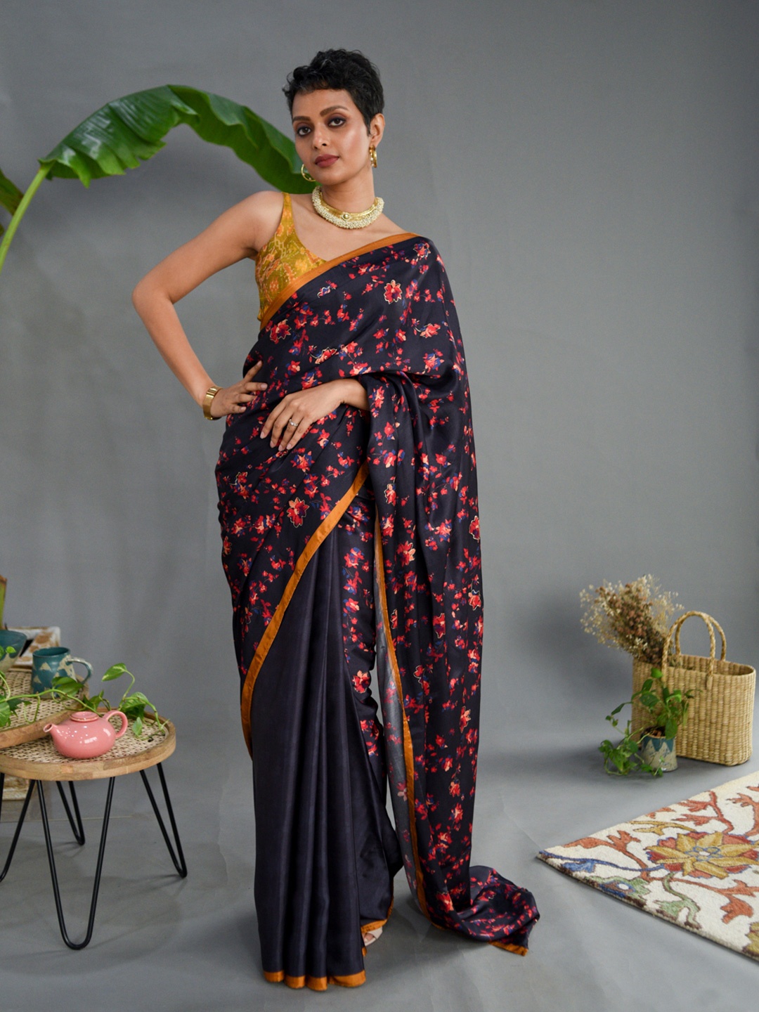 

Suta Navy Blue & Pink Floral Saree