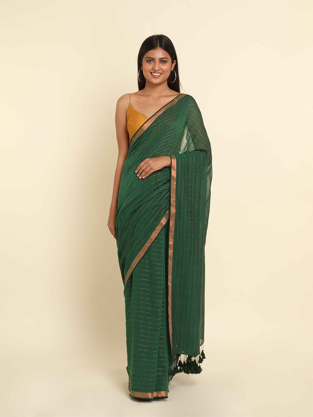 

Suta Green & Gold-Toned Striped Zari Saree