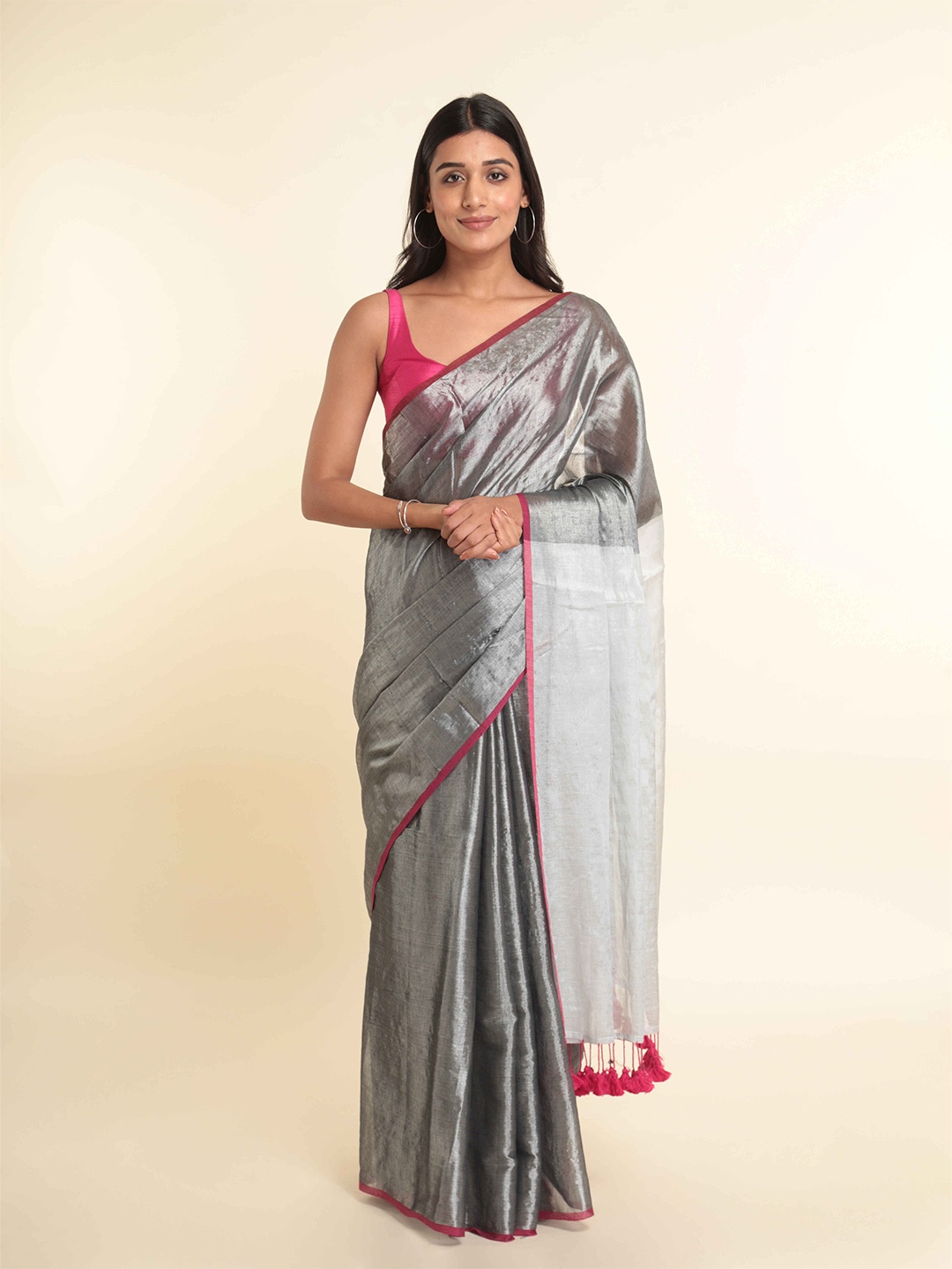 

Suta Silver-Toned & Pink Solid Saree
