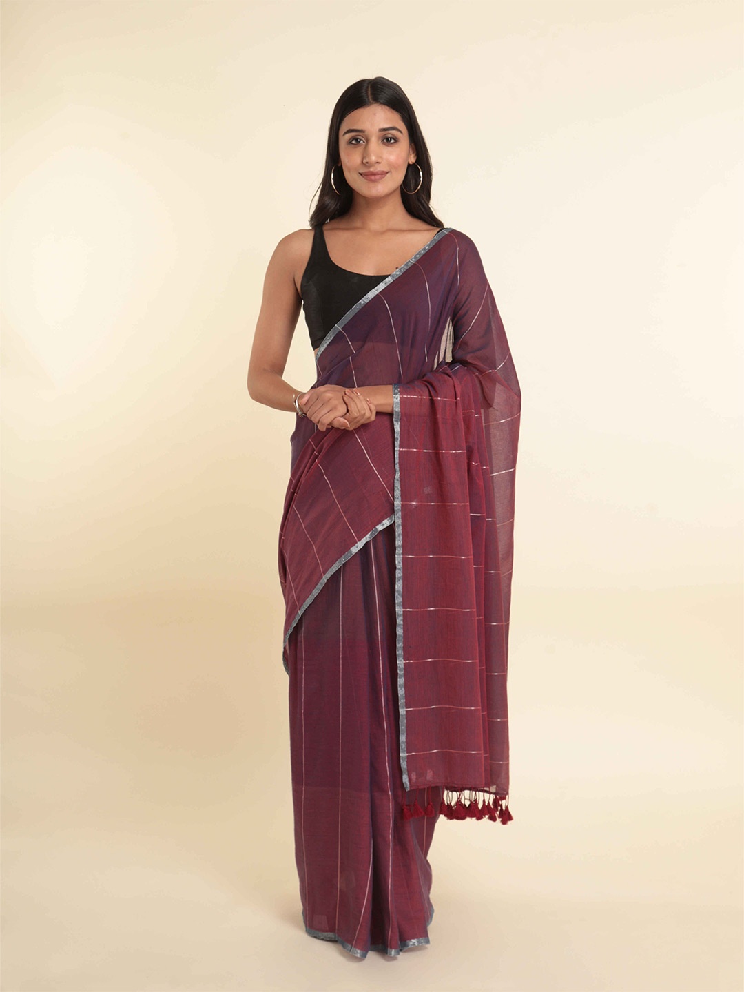 

Suta Maroon Striped Zari Saree
