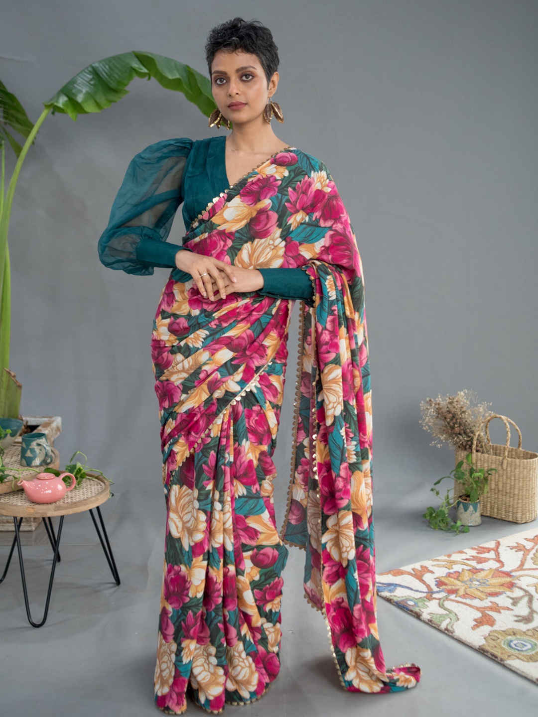 

Suta Pink & Green Floral Printed Saree