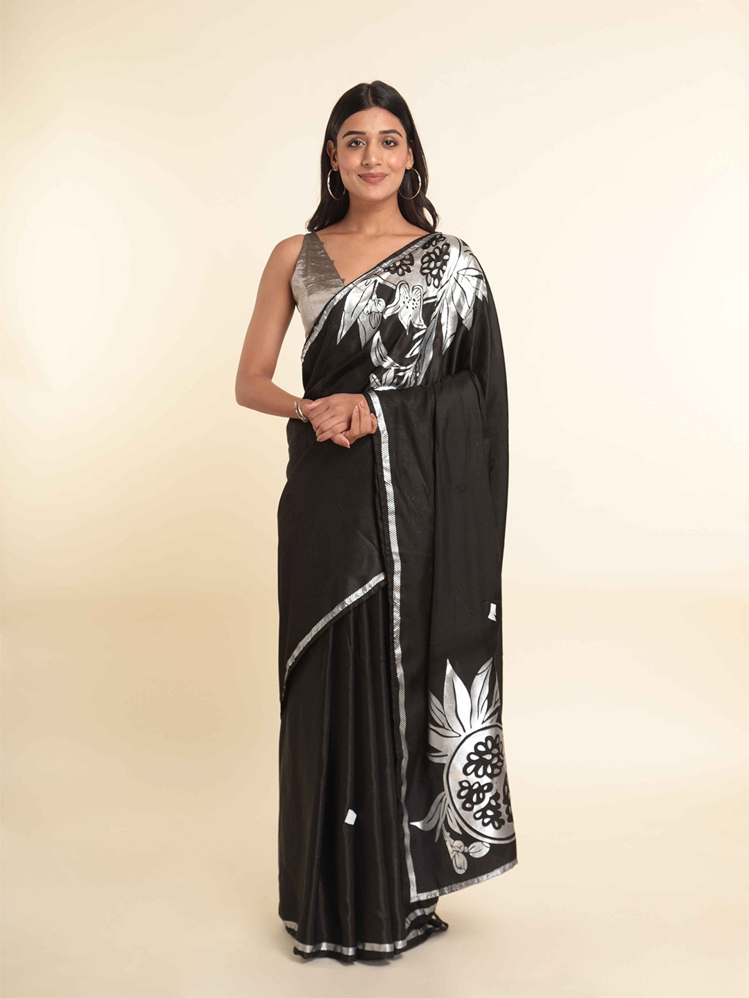 

Suta Black & White Floral Saree