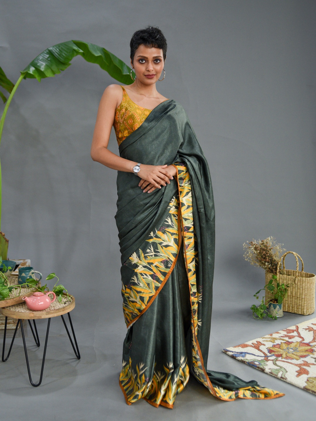 

Suta Green & Yellow Floral Printed Saree