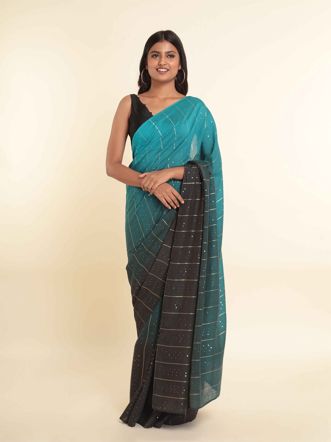 

Suta Blue & Black Striped Embellished Saree