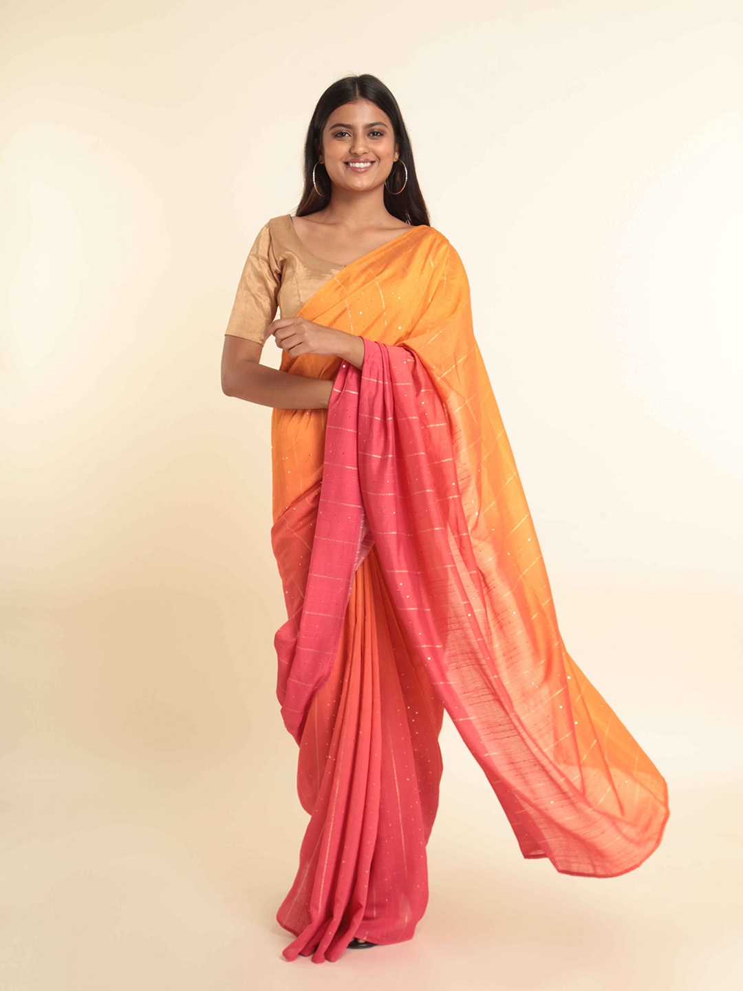 

Suta Coral & Yellow Embellished Saree