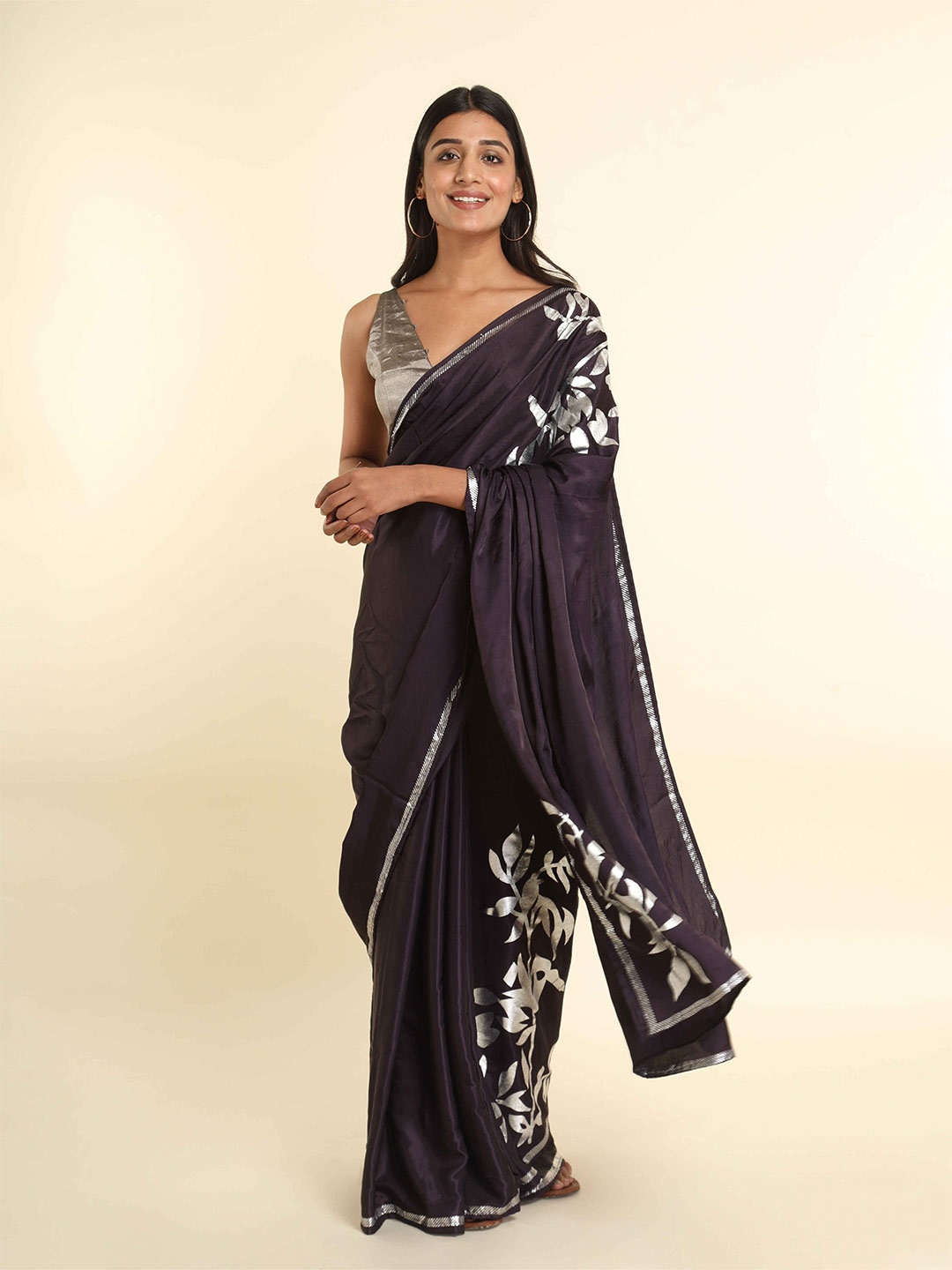 

Suta Black & Silver-Toned Floral Saree