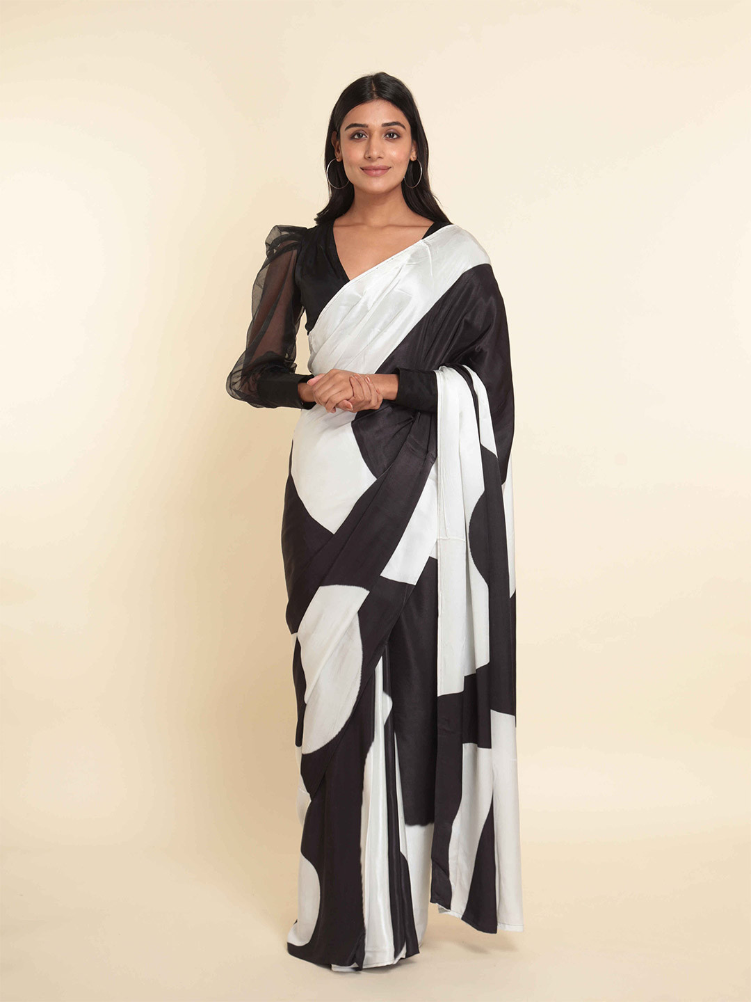 

Suta White & Black Printed Liva Saree