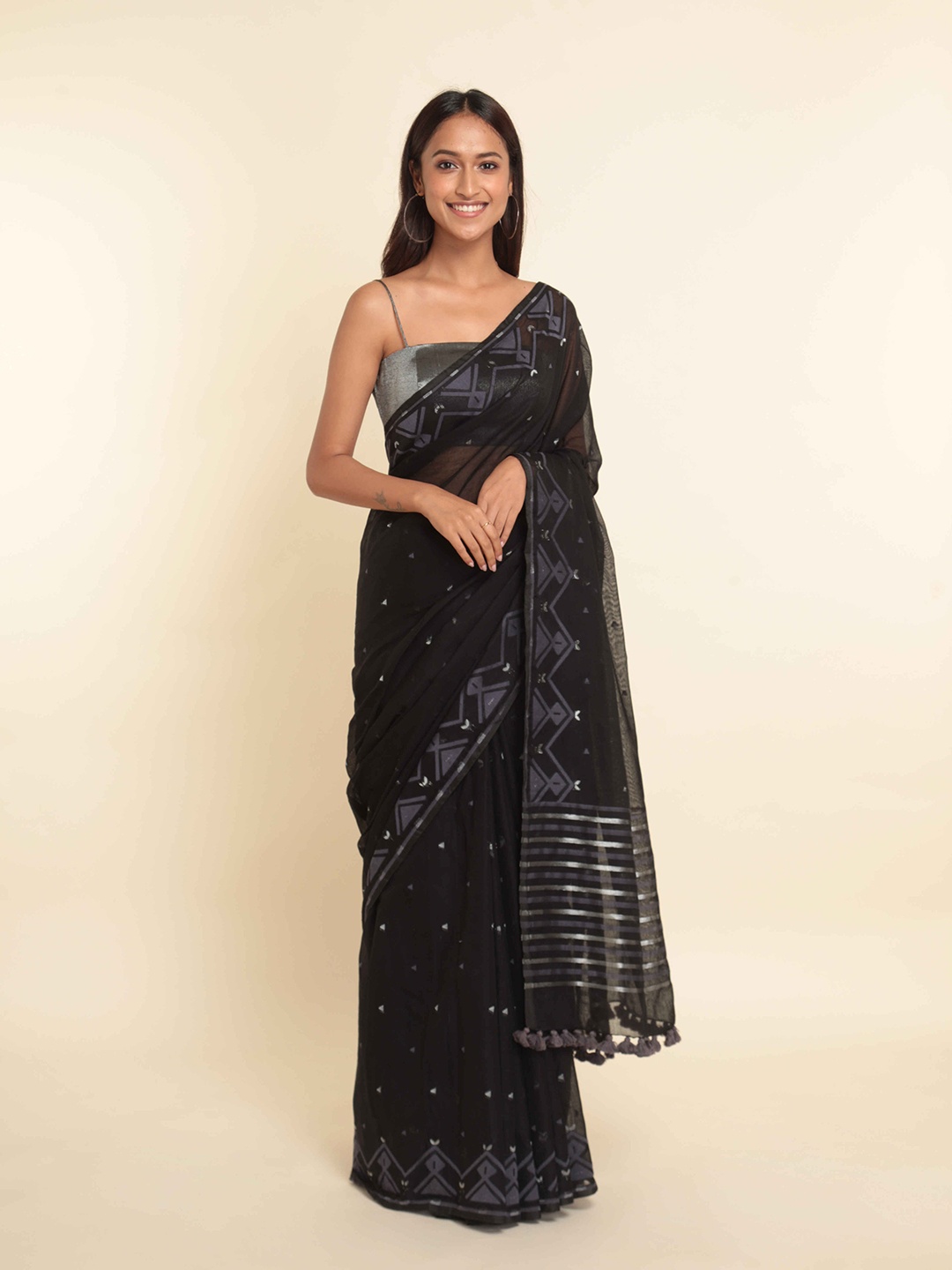 

Suta Black & Silver-Toned Woven Design Saree