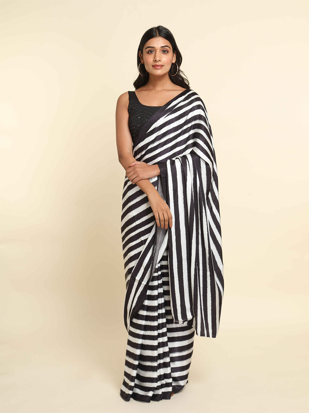 

Suta White & Black Striped Saree