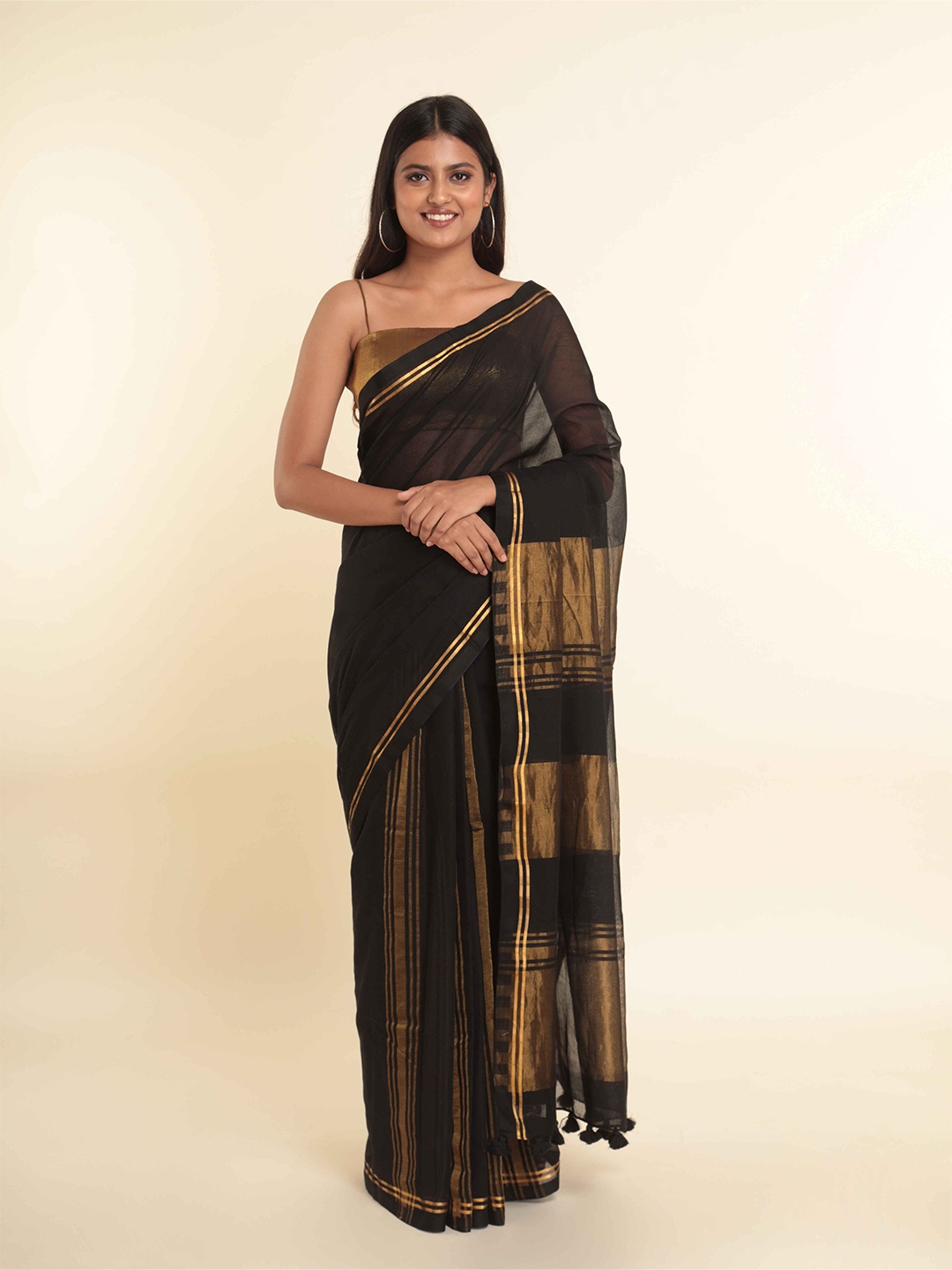 

Suta Black & Golden Striped Zari Saree