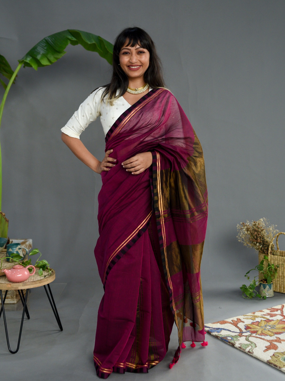 

Suta Pink & Gold-Toned Striped Saree