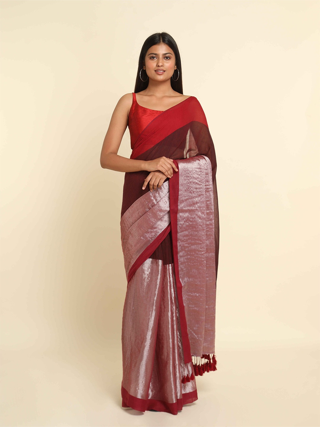 

Suta Maroon & Silver Colourblocked Zari Saree