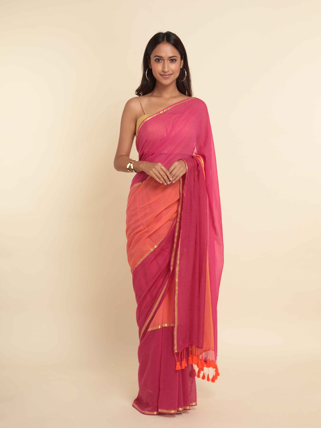 

Suta Red & Orange Colourblocked Saree