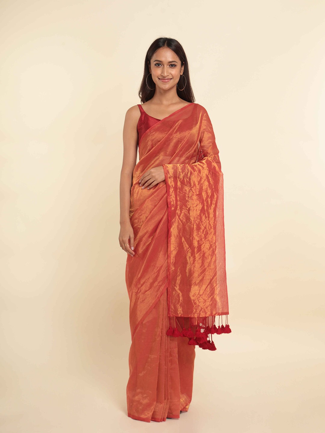 

Suta Copper & Red Saree