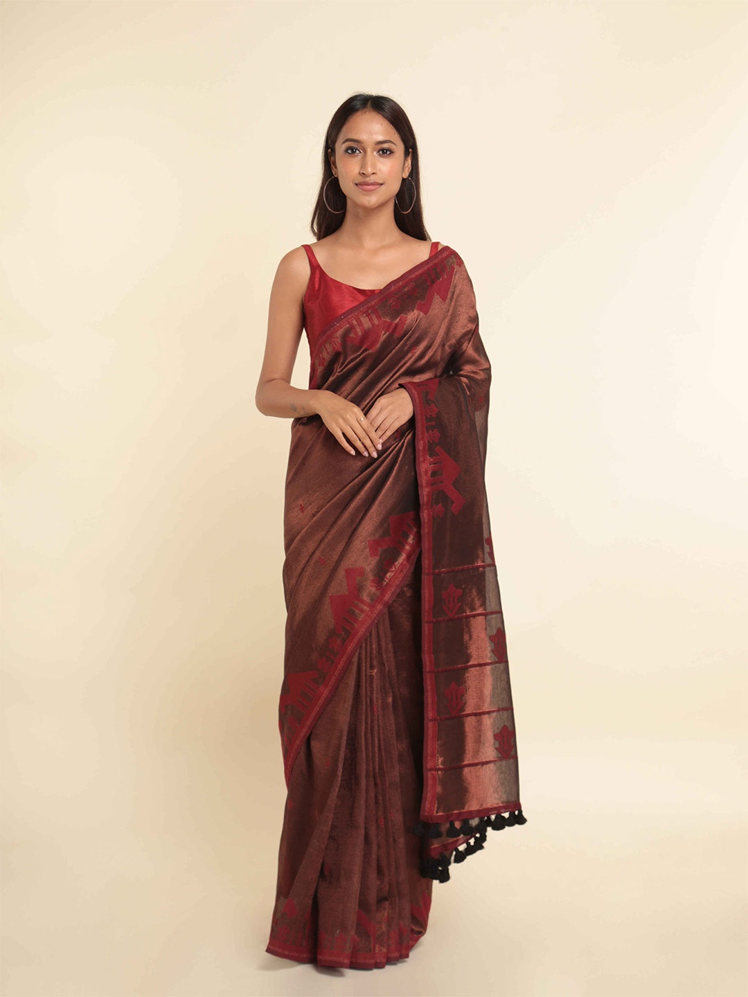 

Suta Brown & Copper Woven Design Saree
