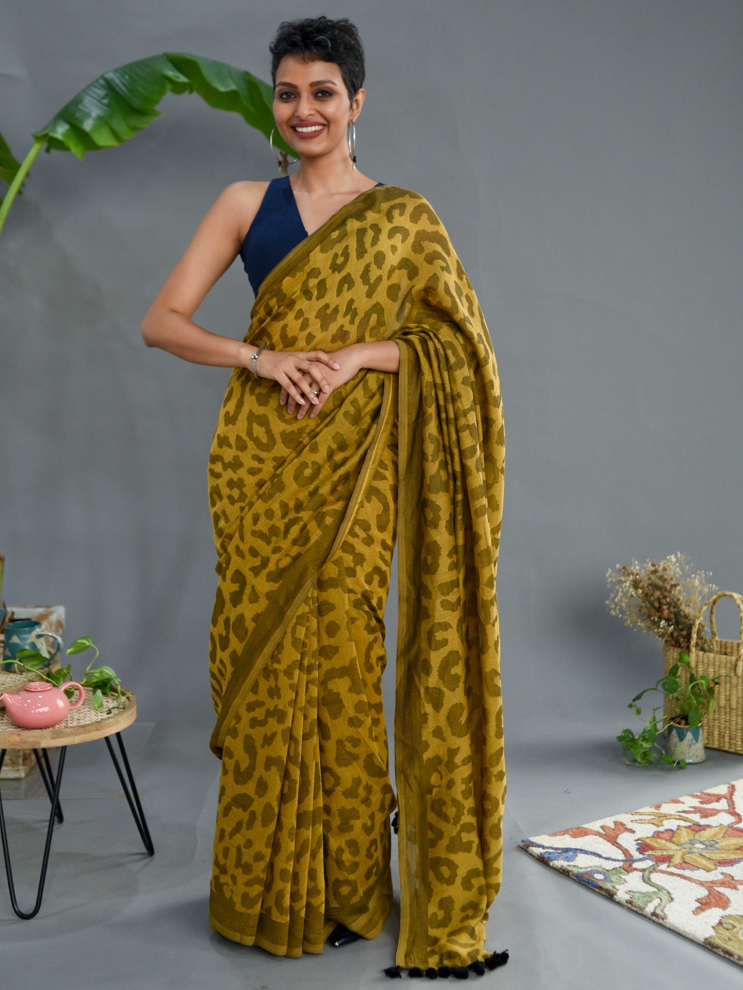 

Suta Mustard & Brown Printed Saree